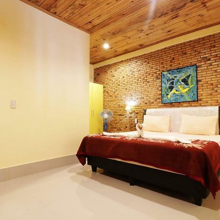 Tuk Tuk Timbul Bungalows Phòng bức ảnh